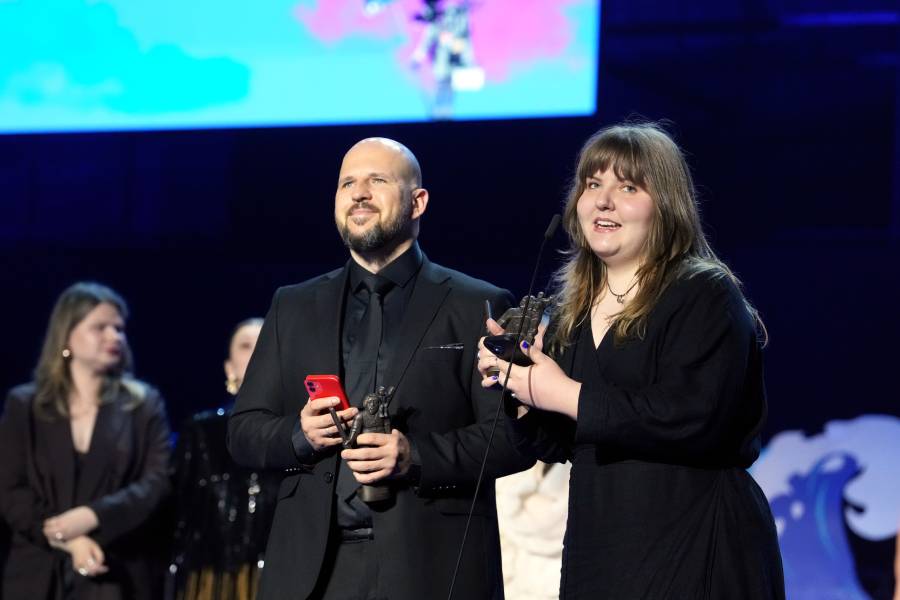 Co-producer Sergejs Timonins and production assistant Liva Vernere receiving the Best Film Award for Red Code Blue, photo by Ieva Lenisa LETA